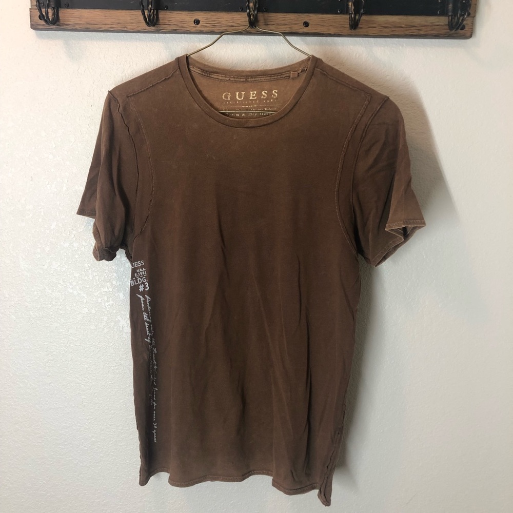Guess distressed t-shirt with calligraphy.